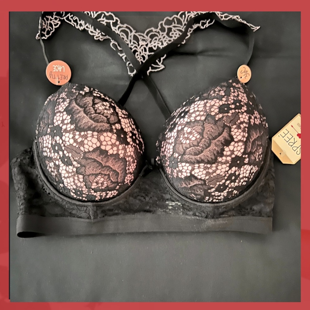 New SPREE INTIMATES BRA size 36C, pink with black lace.